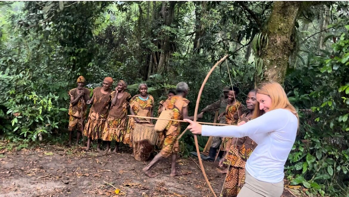Batwa people, the indigenous forest dwellers who once lived as hunter-gatherers within the Bwindi rainforest.