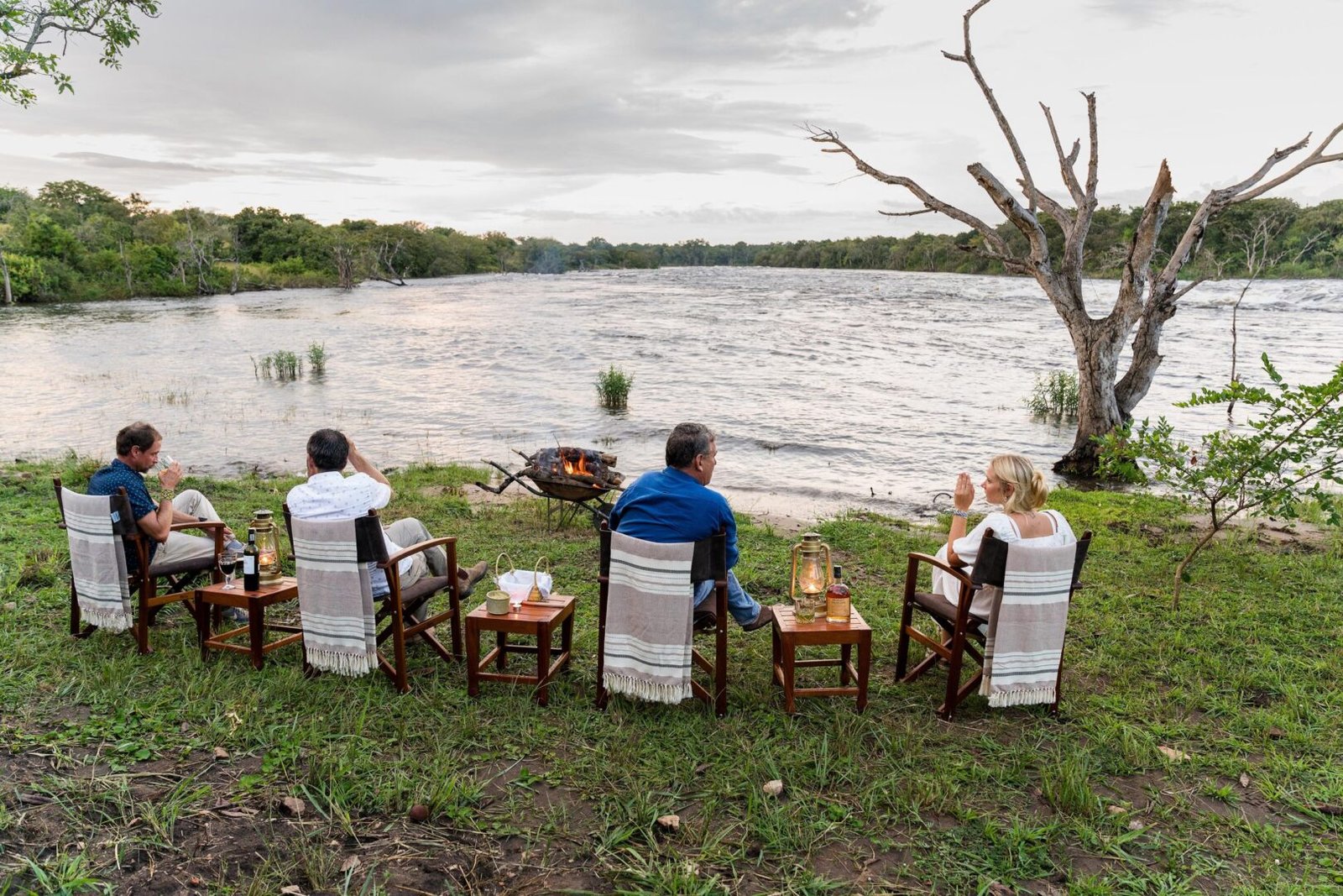 Romantic drink by the river during a Uganda honeymoon safari