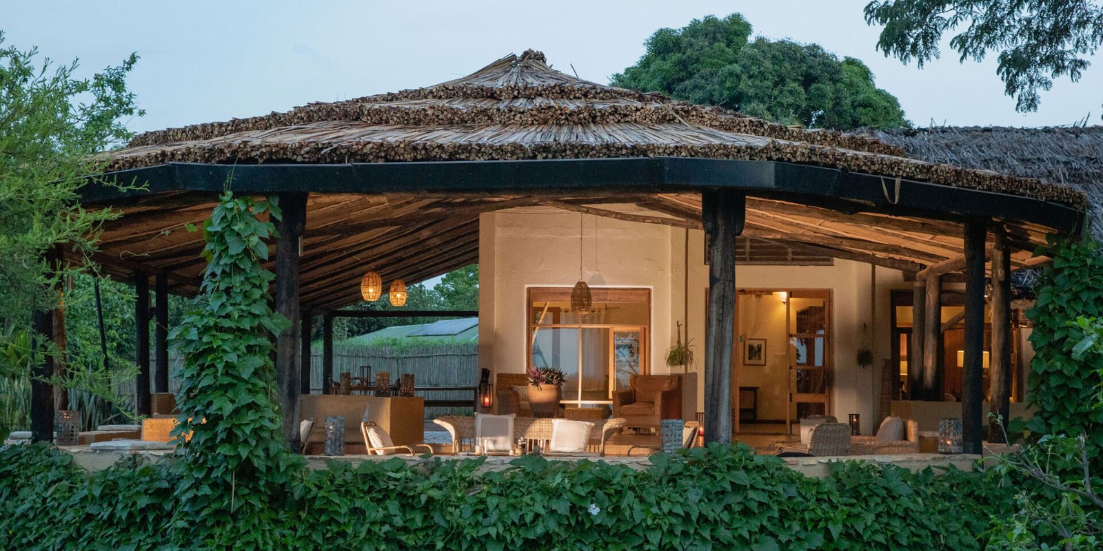 Kyambura Gorge Lodge offers an intimate and highly exclusive safari experience near the famous Kyambura Gorge chimpanzee trekking area in Queen Elizabeth National Park. The lodge is built on the edge of the dramatic gorge and provides stunning views of the surrounding savannah plains, forests, and distant mountain landscapes.