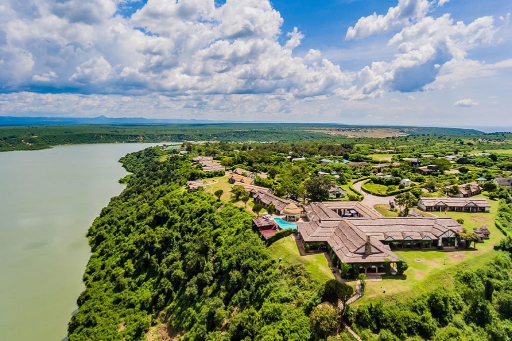 Mweya Safari Lodge is one of Uganda’s classic luxury safari lodges and an excellent addition to gorilla trekking itineraries that combine primates with wildlife safaris. Located on a peninsula overlooking the Kazinga Channel within Queen Elizabeth National Park, the lodge provides spectacular views of waterways, savannah landscapes, and abundant wildlife.