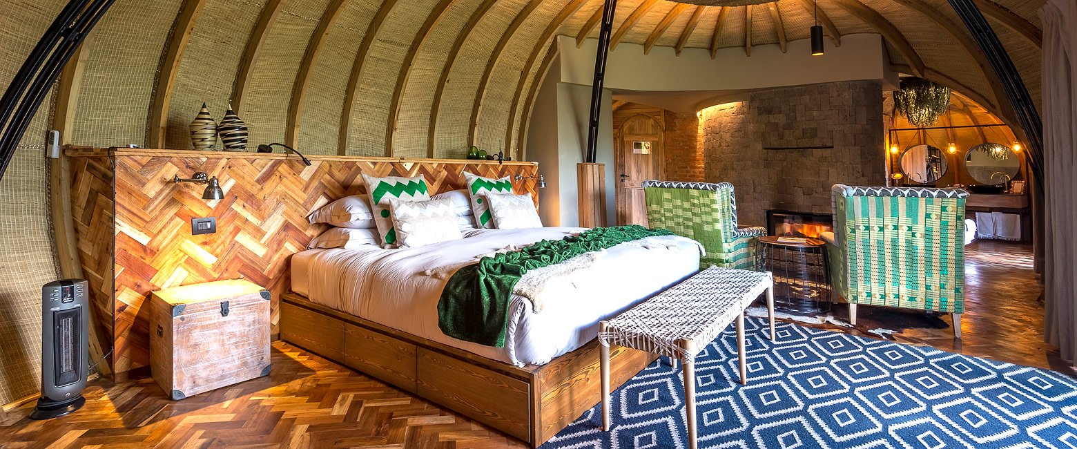 Singita Kwitonda Lodge focuses on refined contemporary luxury with elegant interiors, spacious private suites, modern design elements, and sophisticated safari hospitality. The lodge combines luxury comfort with conservation-focused design while maintaining a warm and intimate atmosphere throughout the property.