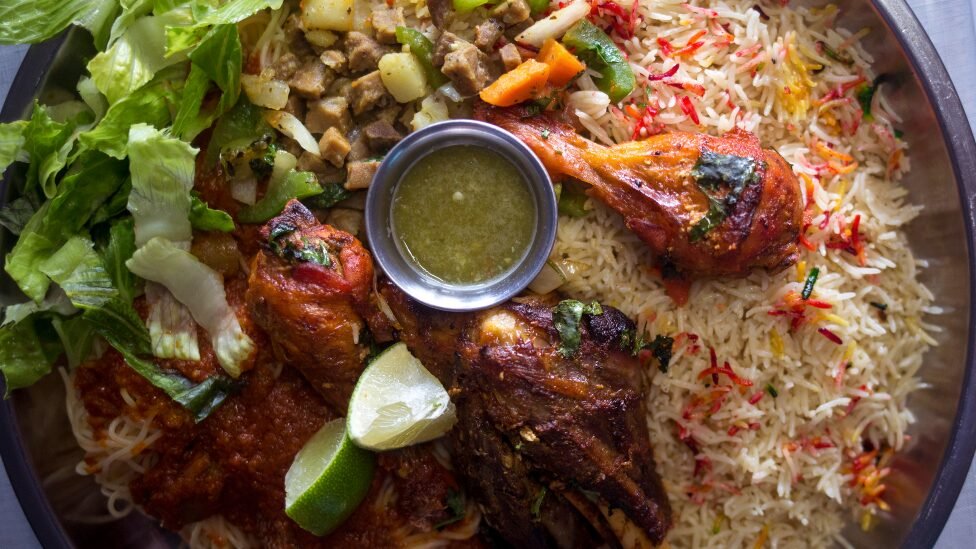 Exploring restaurants in Mogadishu allows visitors to enjoy traditional meals prepared with fresh ingredients, locally sourced spices, and time-honored cooking techniques. Popular dishes include bariis iskukaris, a fragrant rice dish often prepared with aromatic spices, meat, and vegetables; canjeero, a traditional Somali flatbread commonly