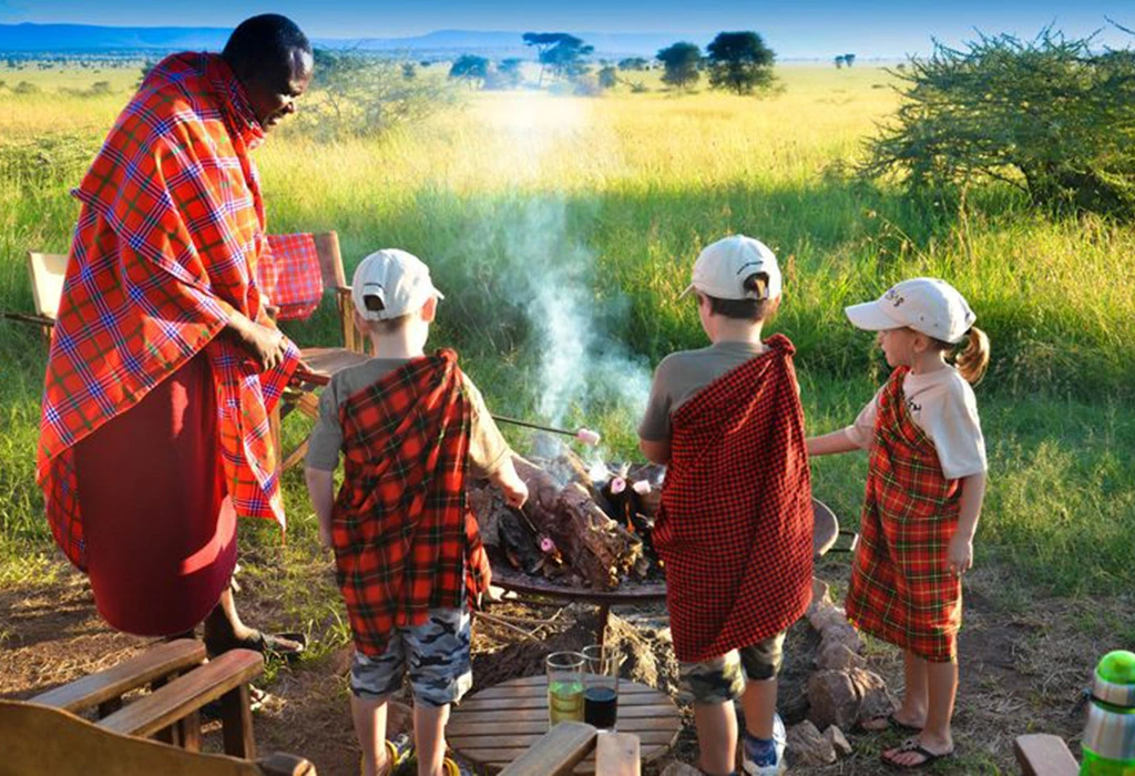 Proper preparation helps ensure children enjoy their chimpanzee safari experience. Families should explain what to expect before traveling, including 