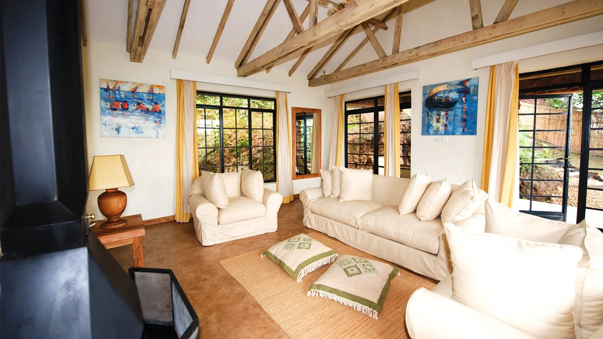 Clouds Mountain Gorilla Lodge is one of the standout Uganda Luxury Lodges for travelers trekking in the southern Bwindi region. The lodge sits on a mountain ridge with expansive views toward the Virunga Volcanoes and the Great Rift Valley, creating one of