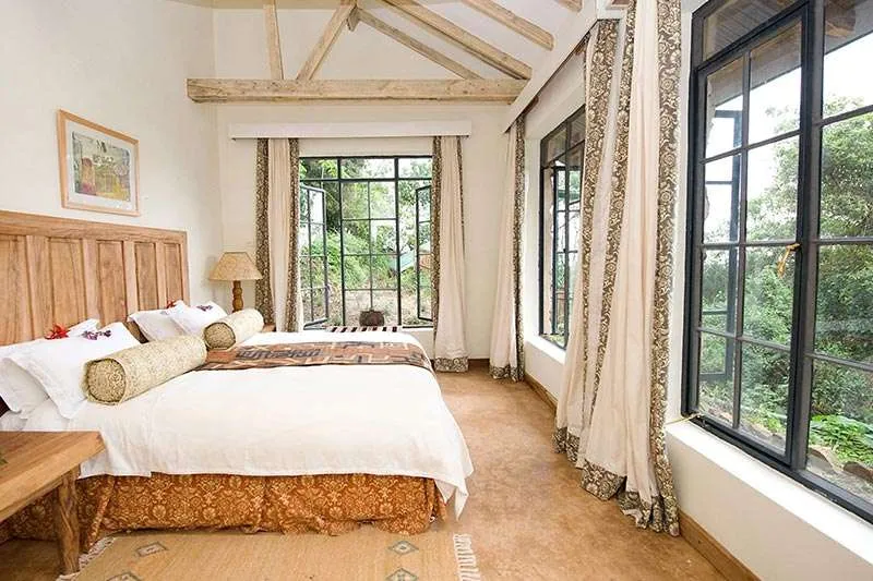 Luxury bedroom at Clouds Mountain Gorilla Lodge Bwindi Uganda