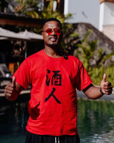 Patrice Evra during Rwanda gorilla trekking and Kwita Izina 2026