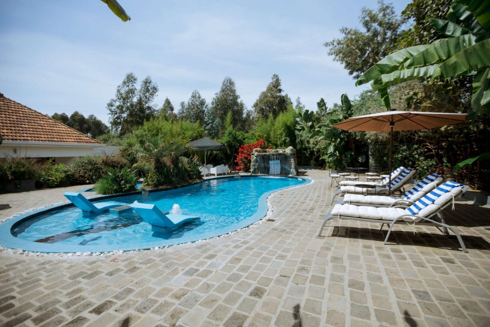 Outdoor swimming pool at Gorillas Volcanoes Hotel Rwanda