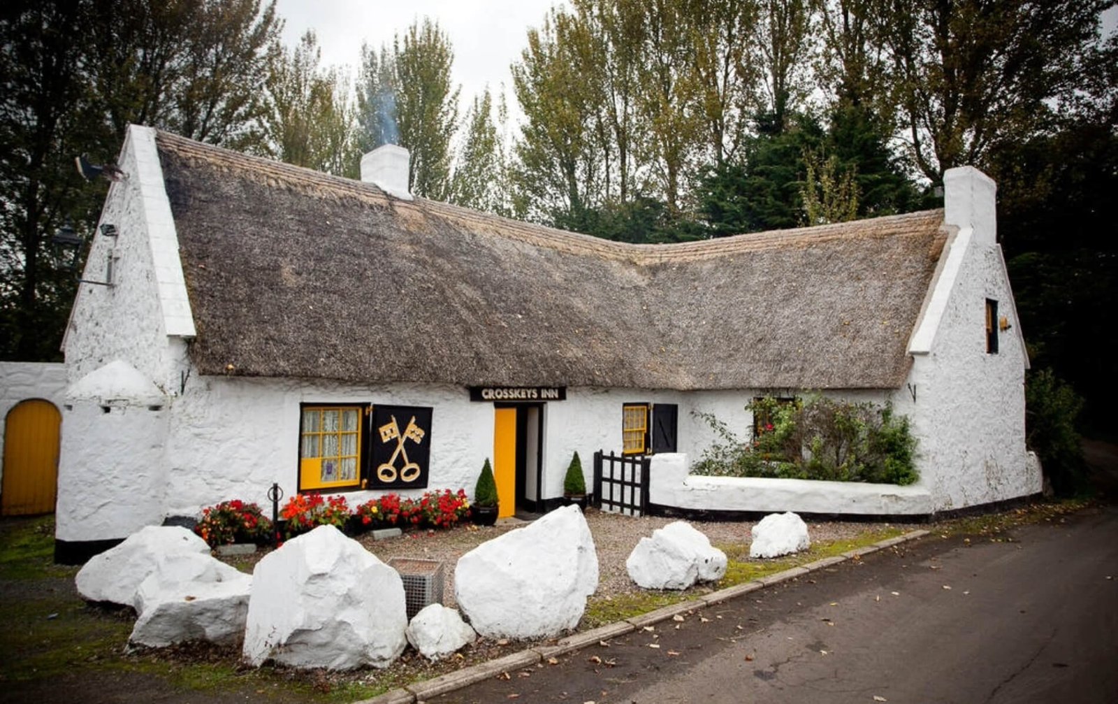 Stone and thatched cottages at Mountain Gorilla View Lodge Rwanda